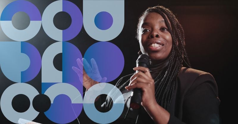 A woman speaking into a microphone to make a difference in care