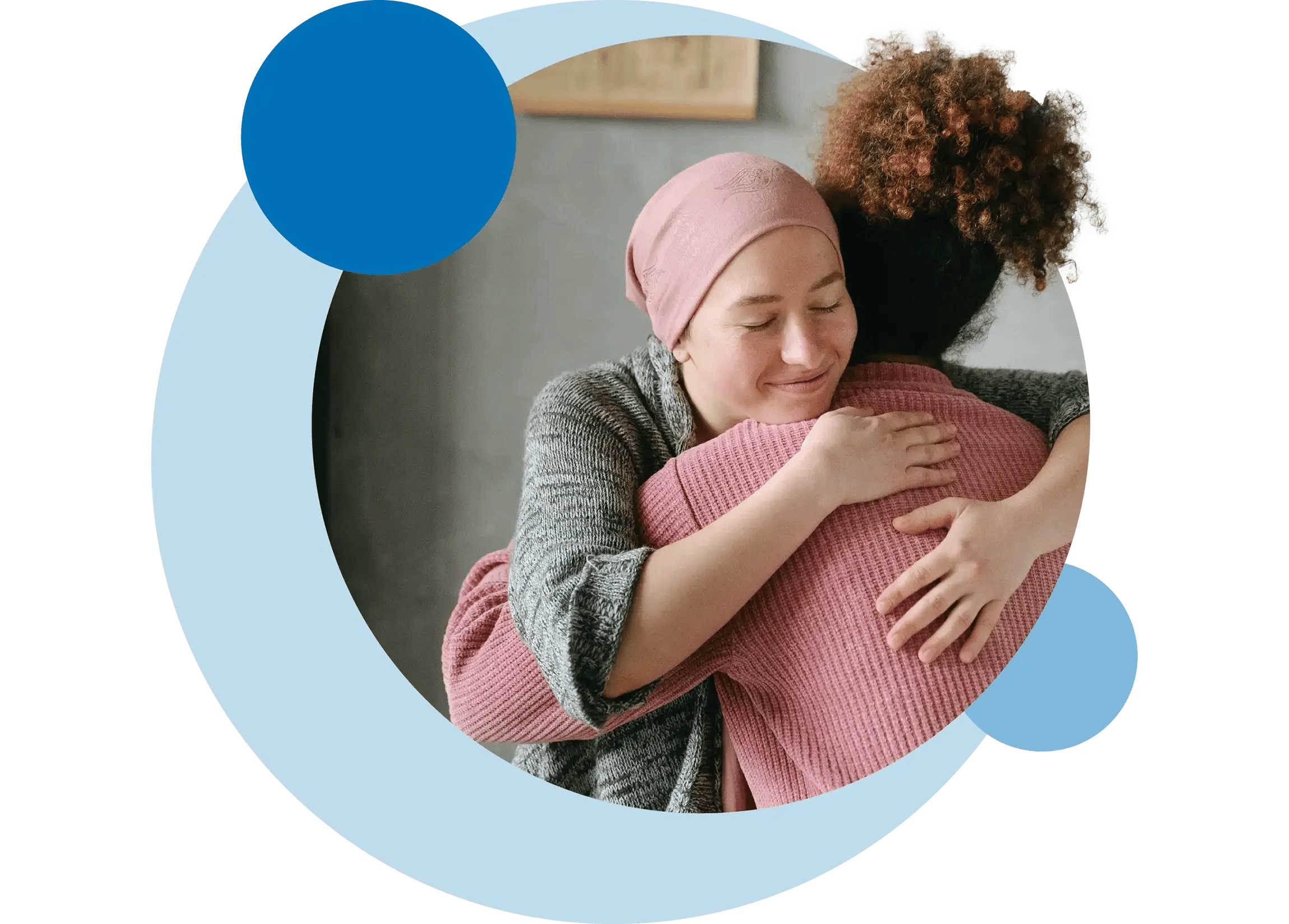 Two women hugging each other