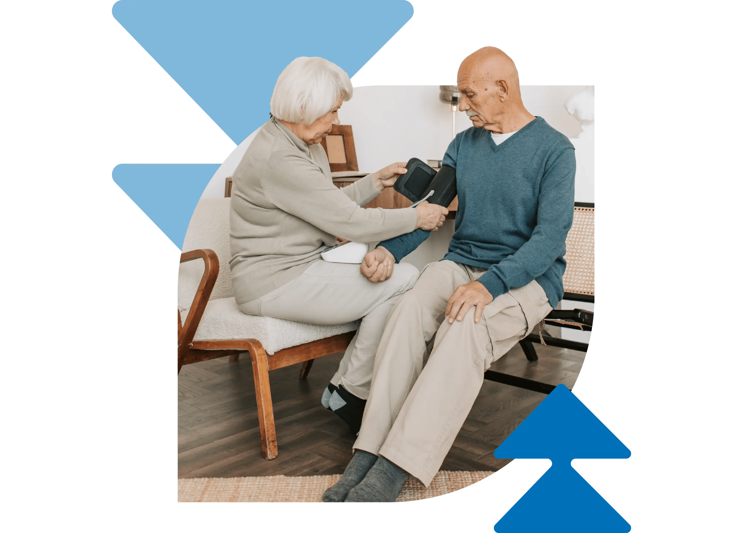 A senior woman using a blood pressure monitor on an older man, both seated