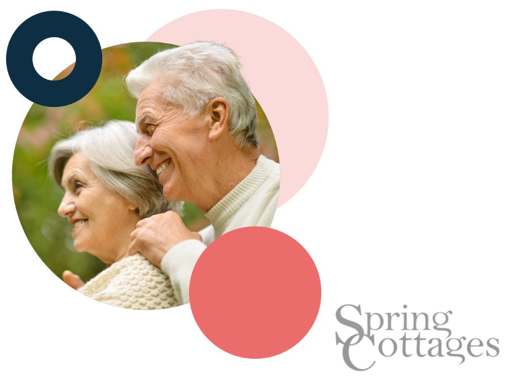 A happy elderly couple plus Spring Cottages logo